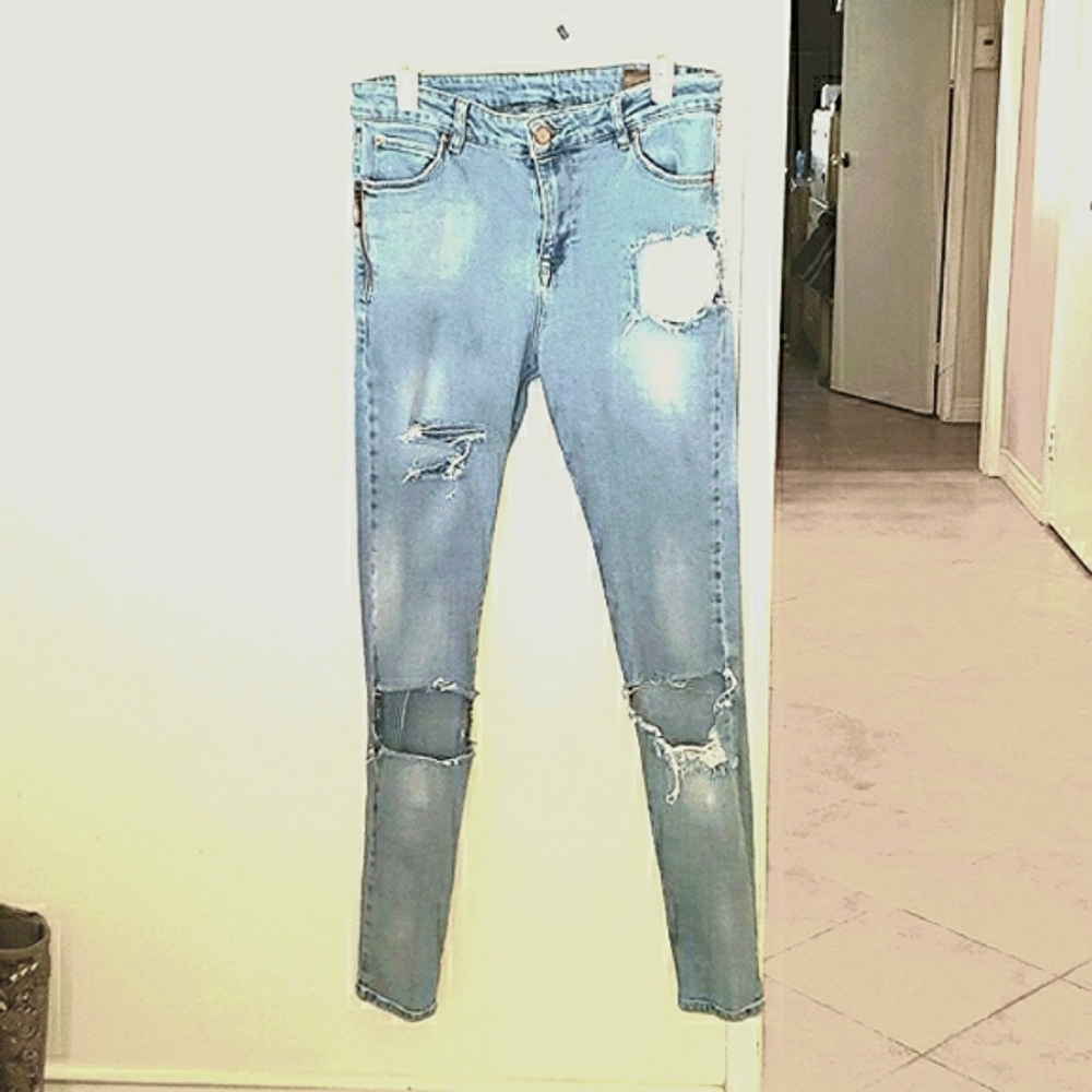 ASOS High-Waist Distressed Light Wash Jeans.